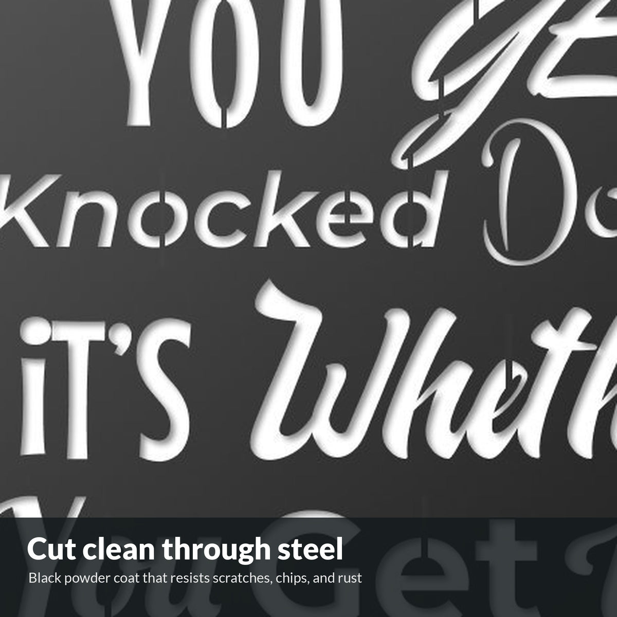 Close-up of letters cut through black powder-coated steel
