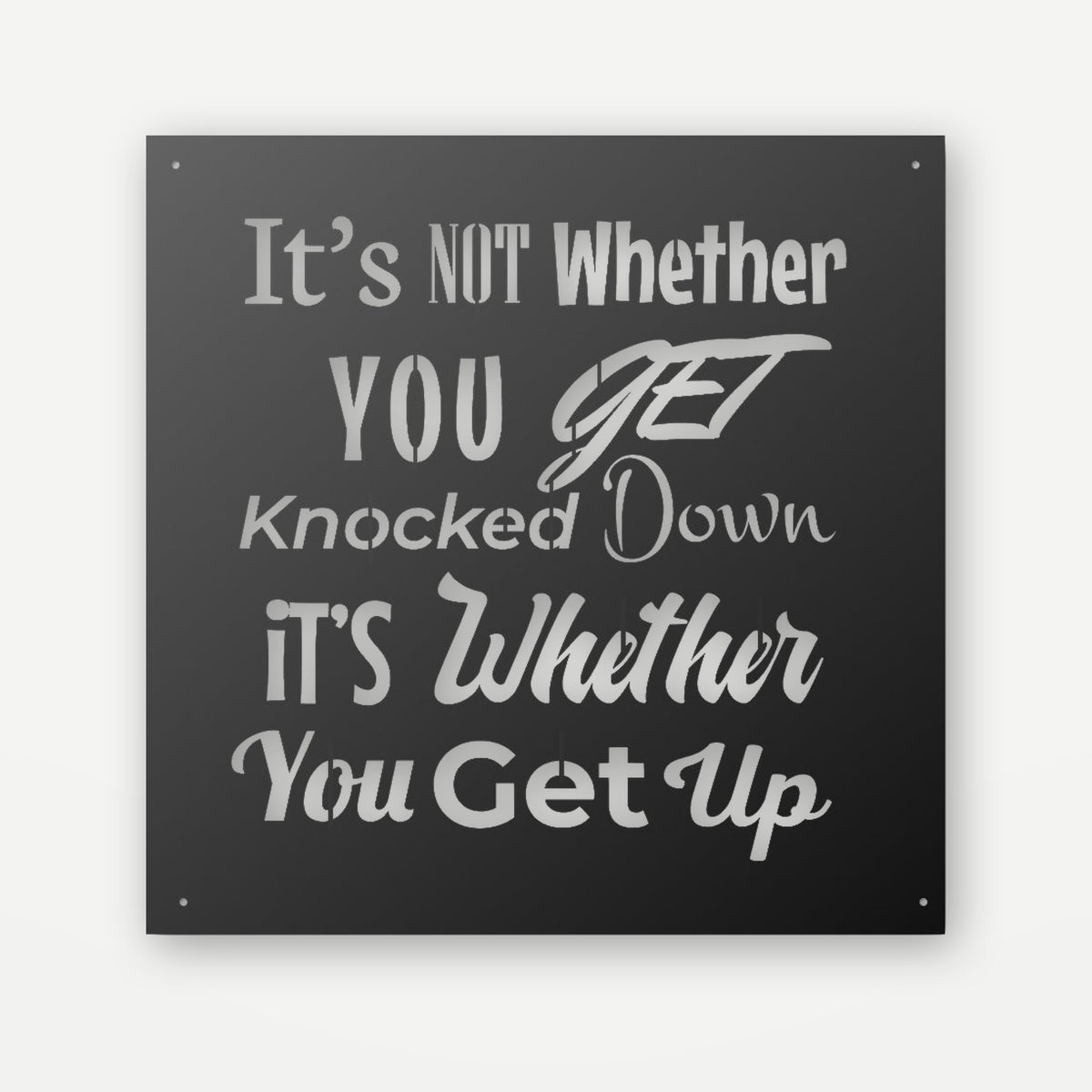 Black steel motivational sign with 'It's not whether you get knocked down, it's whether you get up' cut through, square