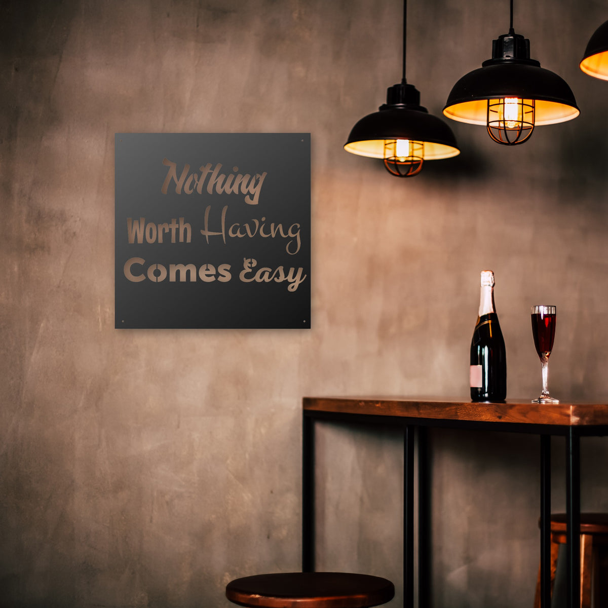 Nothing Comes Easy steel sign on a game room wall